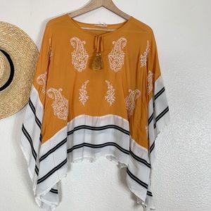 Anthro Floreat gold poncho.